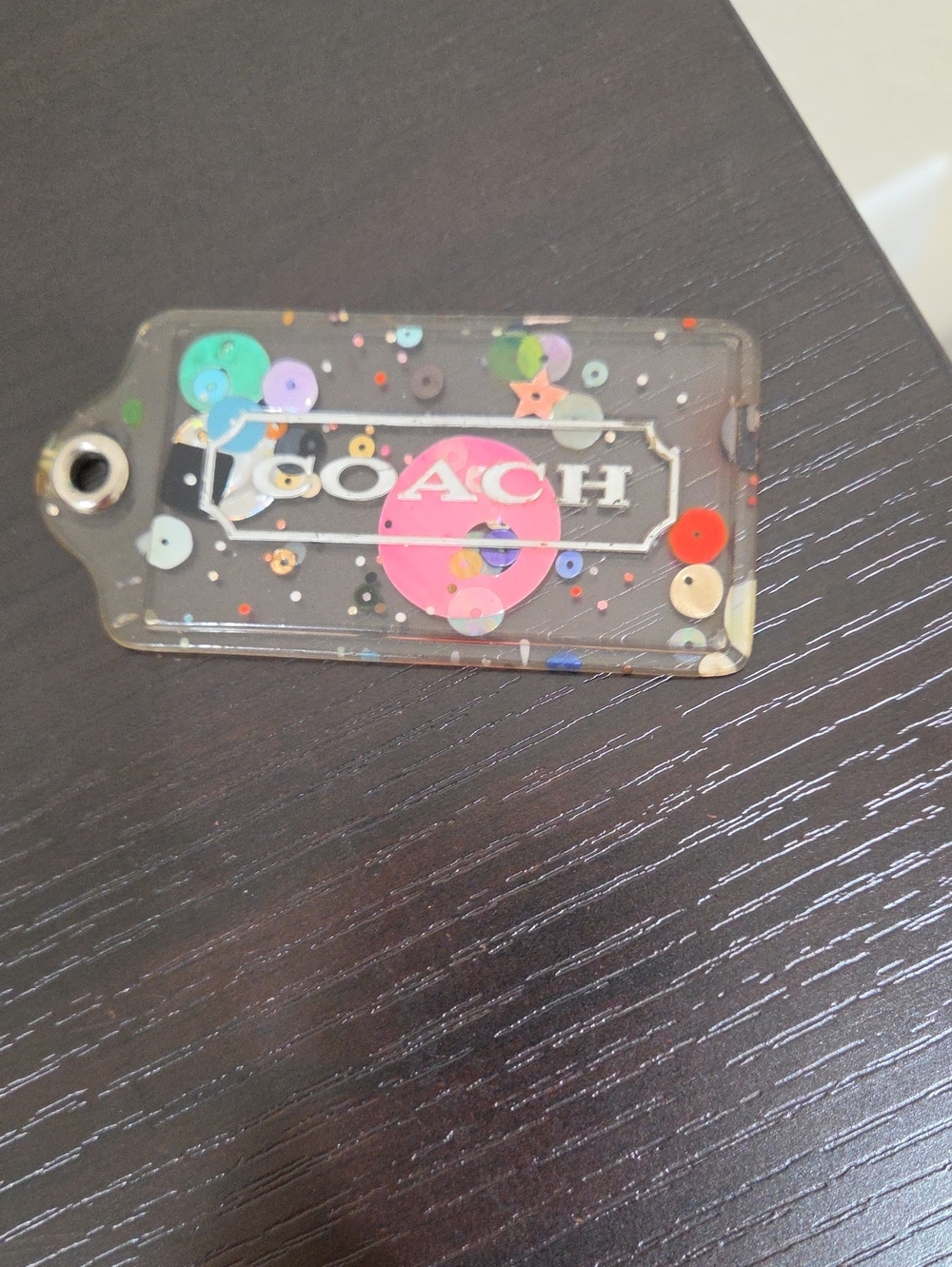 Coach Clear Confetti Tag with Pink Logo Accent